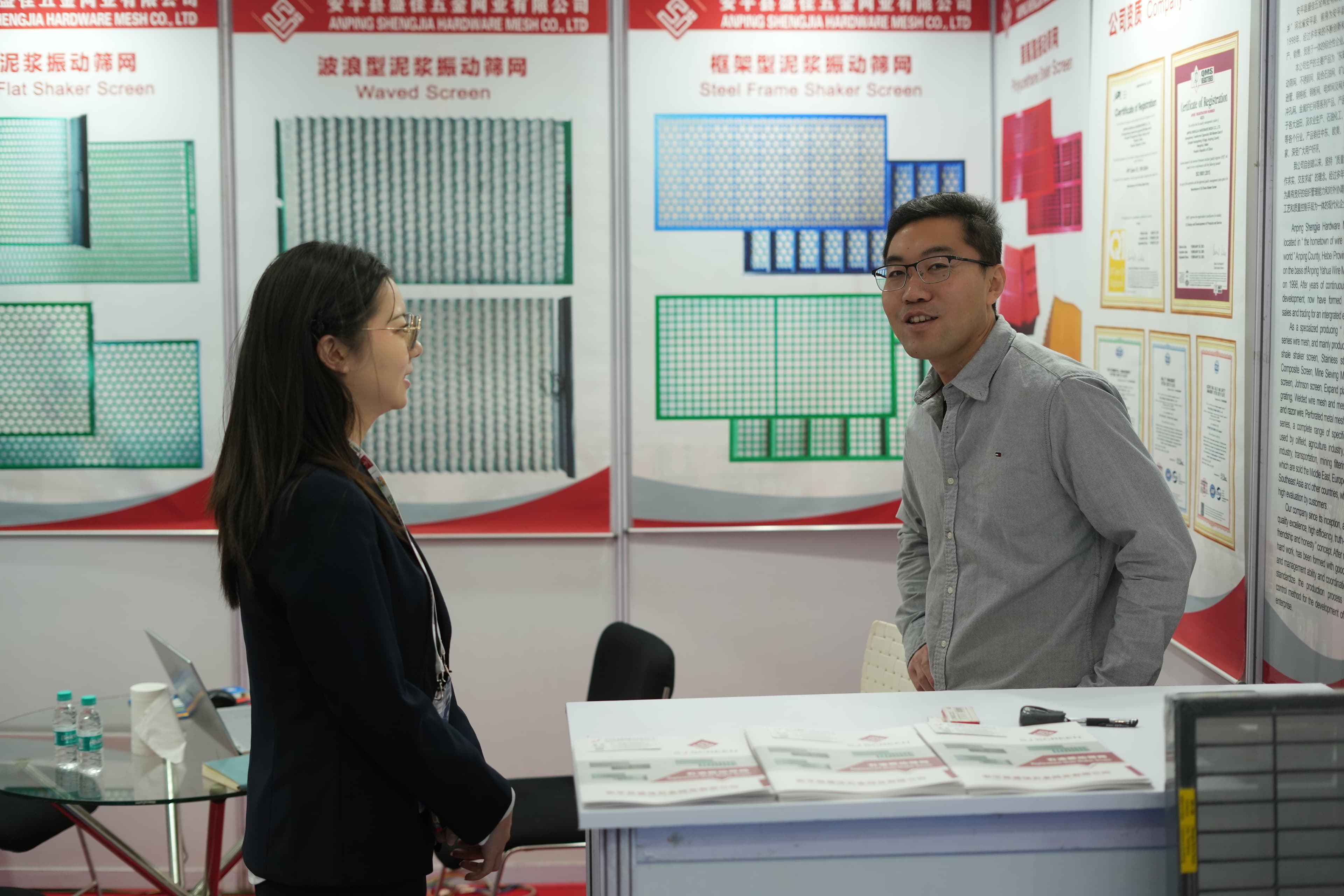 International delegates networking at a country pavilion